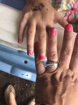 Gel with a little glitter for mom and opi pink with a little nail art for daughter