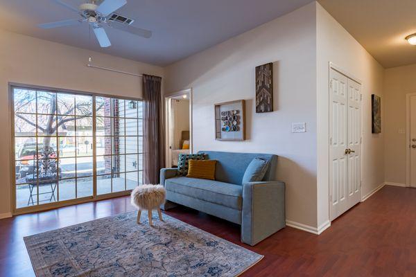 Another view (partial) of the living room. Big patio doors, spacious floor plan.