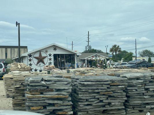 Stone and lots of metal signs for sale