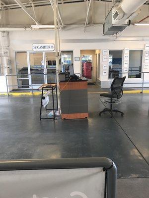 Service desk and cashier area for repairs.