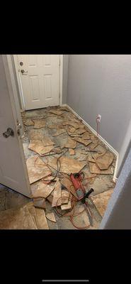 Demo tile to replace with new flooring