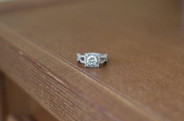 Front view of my ring- circle cut diamond set in a cushion cut halo.