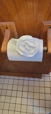 They even folded toilet paper roses.