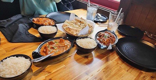 Desi chicken curry ,Tandoori chicken, naan bread and rice