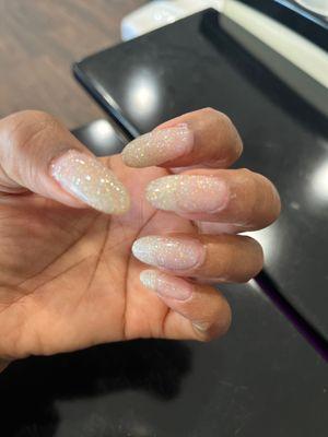 Natural nails dipped in clear glitter gel