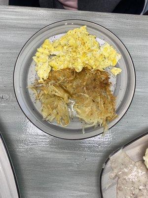 Hash browns and scrambled eggs