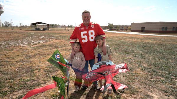 Shawn K Osborne, President of Osborne Financial Group Insurance Services with his grand blessings.