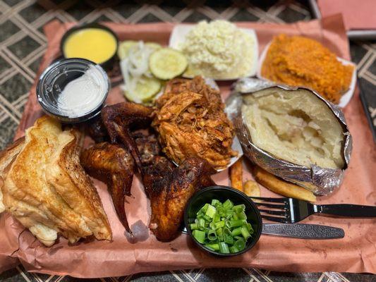 Choice of Two- Texas Brisket, Pulled Chicken, Smoked Chicken Wings, Baked Potato, sweet potato casserole and slaw.