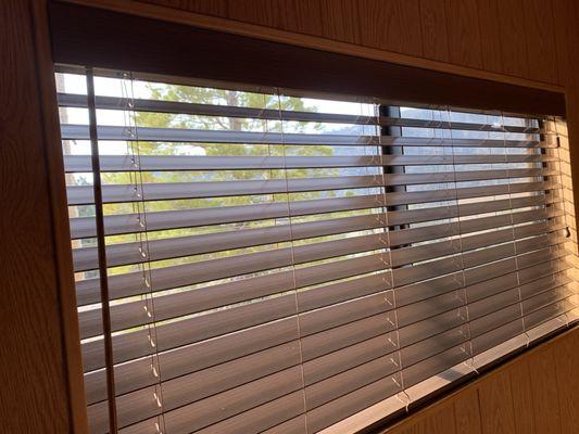 Faux wood blind for the bedrooms.