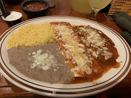 Vegetarian #1, burrito, enchilada, and rice/beans   Sour cream was an extra $1.25