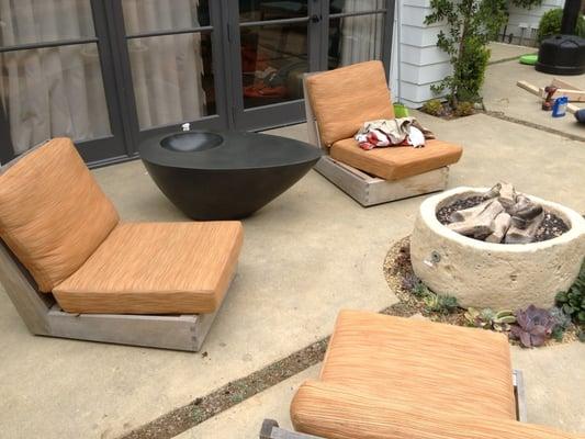 Exterior concrete side table with integral drink cooler