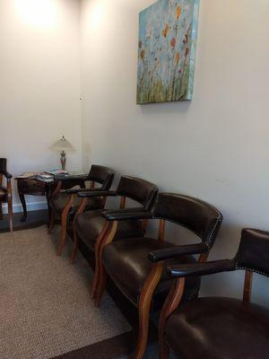 Inviting waiting area with comfy seats!