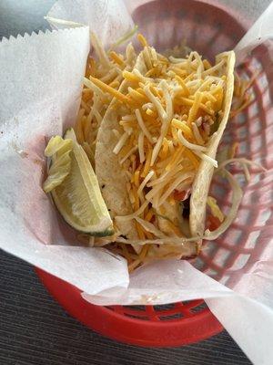 Steak tacos with mango salsa (he ate one already, comes with 3 per order)