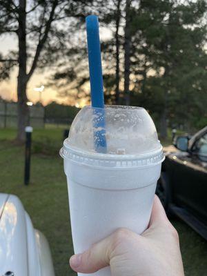 Chocolate milkshake with a huge straw