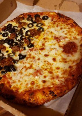 Thin crust half and half extra cheese on 1/2 and sausage olives and extra cheese on the other