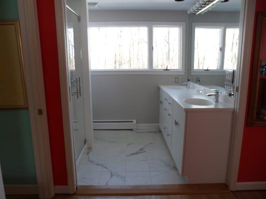 Ultra Craft vanity cabinets and Corian Cameo White vanity top in West Hartford, Ct bath.