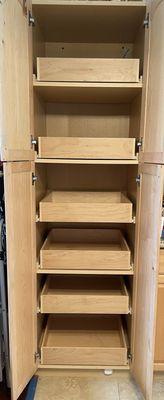 He made and installed pullout drawers in our kitchen pantry.