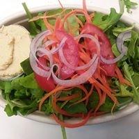 Organic greens & carrots, topped with red onion & tomato, served with homemade hummus and vinaigrette for only $5!