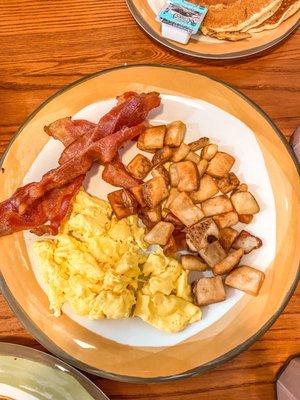 Eggs bacon and home fries