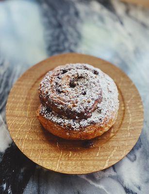 Nocciola. Chocolate hazelnut spread with candied hazelnuts snuggled in croissant dough