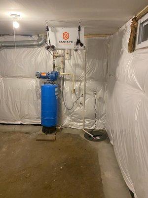 Installation of 12MIL Vapor Barrier, Subfloor Drainage system, Zoeller 1/3 HP Sump pump and Sante Fe 70 Dehumidifier