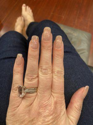 Pictures don't do any justice. Natural nails dipped plus a gel polish.