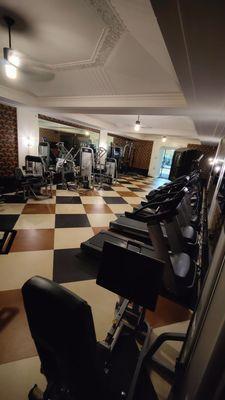 The in- house ( basement ) gym