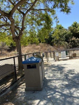 Entrance gates, trash bins