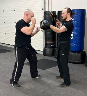 Boxing combinations in Krav Maga at Triumph Martial Arts in Clive.