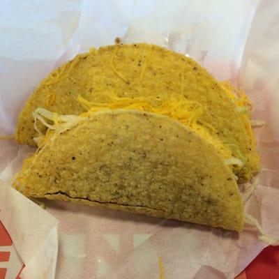 "Classic" taco (bigger, with tomatoes, $1.29) vs. value taco ($.69, no tomatoes).