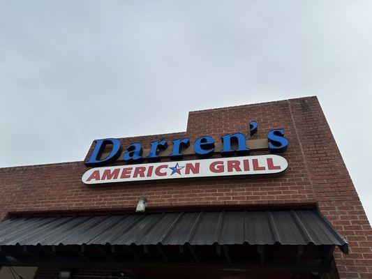 Signage over the corner of the restaurant. Located at Jupiter & Lookout.