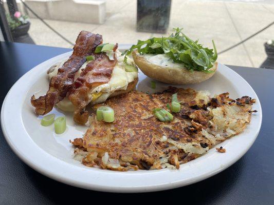 Open breakfast sandwich and hash browns