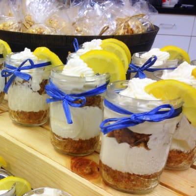 Lemon icebox pies presented in mason jars. And, yes! Those are caramel popcorn balls in the back :-)