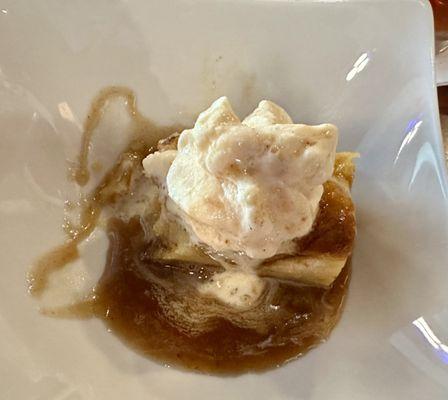 Lunch size bread pudding with rum sauce and a bit of ice cream--yummy