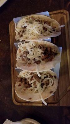 Steak tacos with cheese