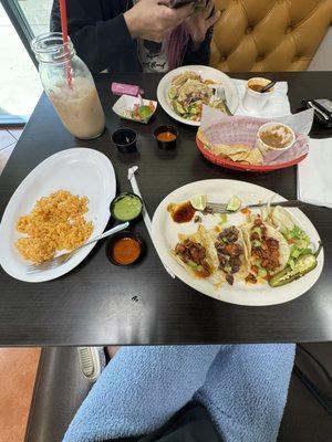 Birria, pastor, carne asada mini tacos. Horchata and Spanish rice