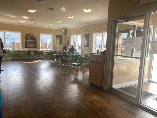 Beautiful dining room with lots of light.  The hard floor makes it a bit noisy in here, but not bad.