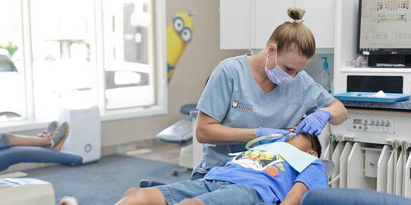 Our Lead Dental Assistant Jennifer creating another happy smile.