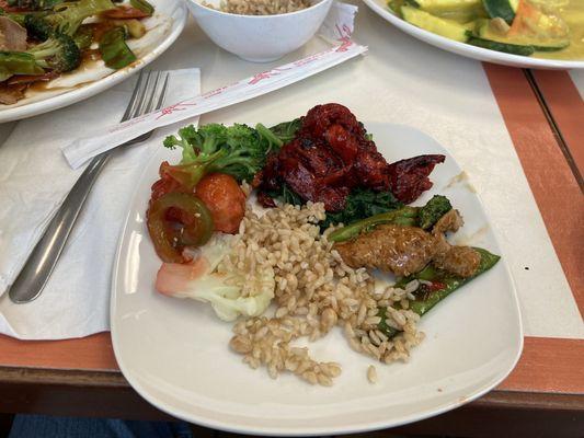 Vegan BBQ ribs, sweet sour chicken, Happy Family, curry all on one dish