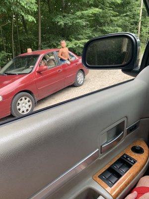 Office lady driving around with her kids hanging out of the windows. But you can't have more then 4 on your golf cart