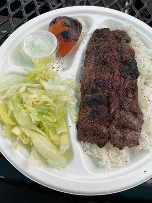 $11 for two small strips of meat, rice, lettuce, and a slice of grilled tomato.  Disappointed....