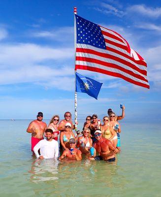 The flag that Captain Charlie marked Islamorada Sandbar many years go with.