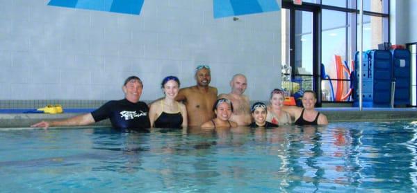 Coach Thorburn with group doing a swimming lesson