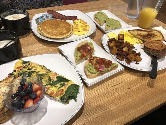 Greek Omelet, avocado toast, steak and eggs, and 3 little deuces.