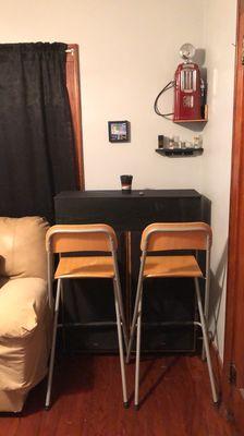 Mobile mini sit at bar counter with speakers attached