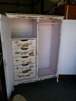 heavily worn pink wardrobe