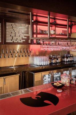 Flying Guillotine bar top emblazoned with Wu-Tang logo