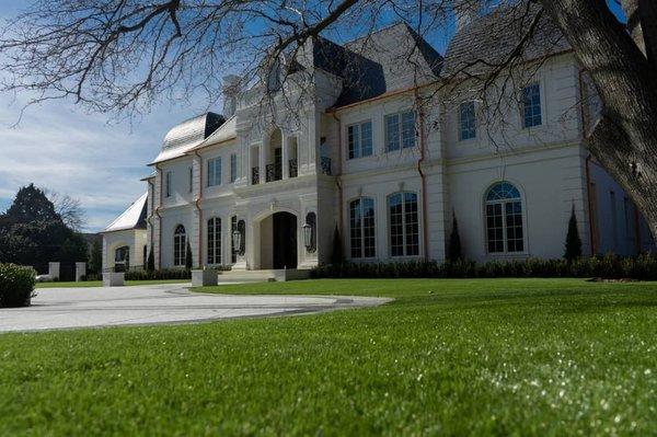 Artificial grass front lawn at a beautiful home in Dallas, Texas.