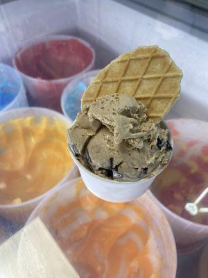 Salted Caramel Chunk Gelato.  Decadent!  Served with a crisp Italian cookie and a smile.