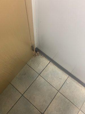 Just one corner of the men's bathroom floor